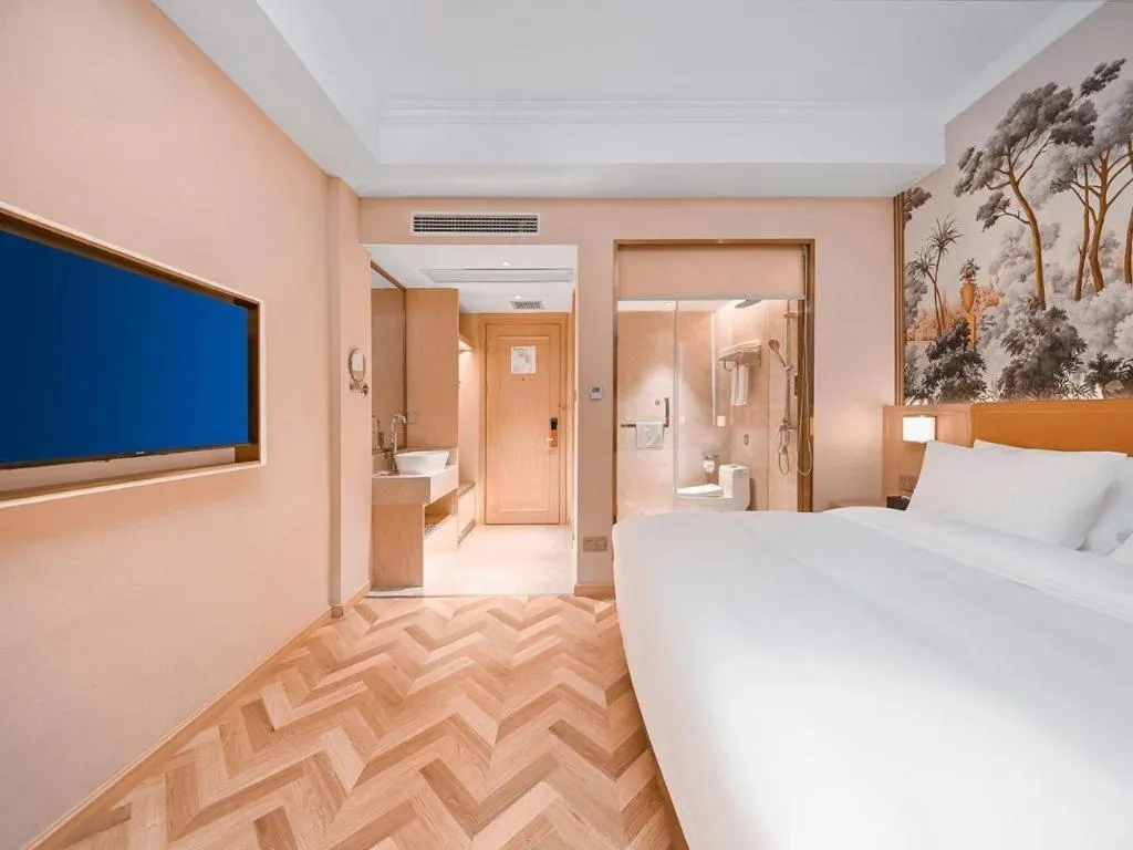 Bed in Vienna Hotel Jiangxi Ganzhou Ningdu Bus Station