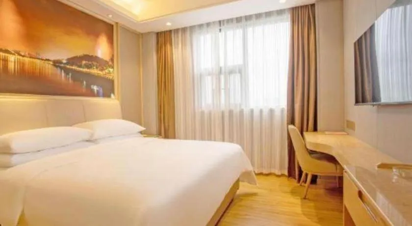 Bed in Vienna Hotel Zhuhai Huafashangdu Nanping Science Industrial Park