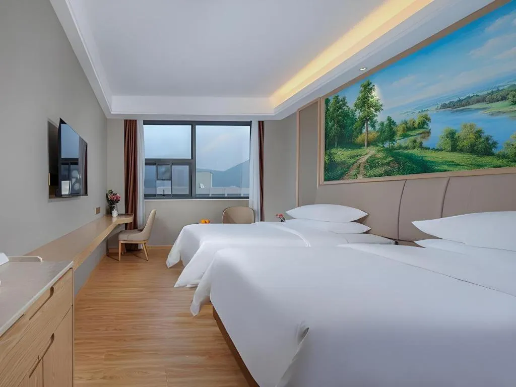 Bed in Vienna Hotel Zhuhai Huafashangdu Nanping Science Industrial Park