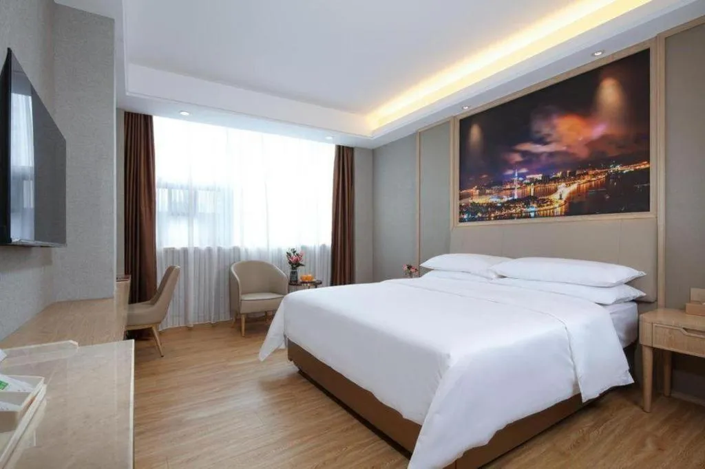 Bed in Vienna Hotel Zhuhai Huafashangdu Nanping Science Industrial Park