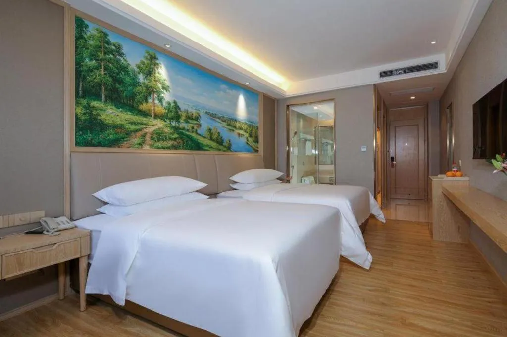 Bed in Vienna Hotel Zhuhai Huafashangdu Nanping Science Industrial Park