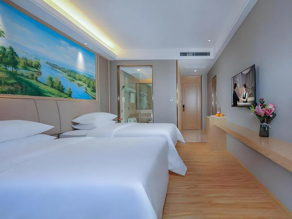 Bed in Vienna Hotel Zhuhai Huafashangdu Nanping Science Industrial Park