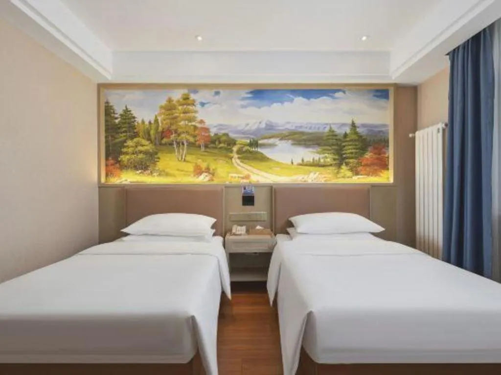 Bed in Vienna Hotel Beijing Changping Metro Station