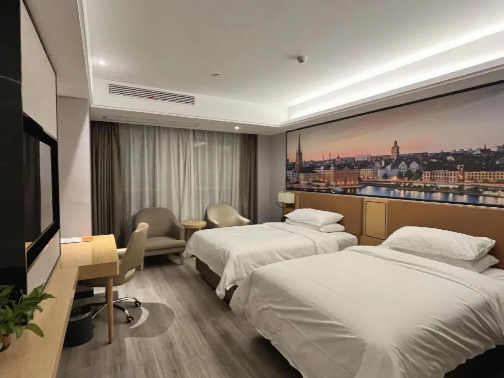 Bed in Vienna Hotel Jiangxi Shangrao High-Speed Railway Station