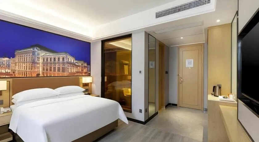 Bed in Vienna Hotel Jiangxi Shangrao High-Speed Railway Station