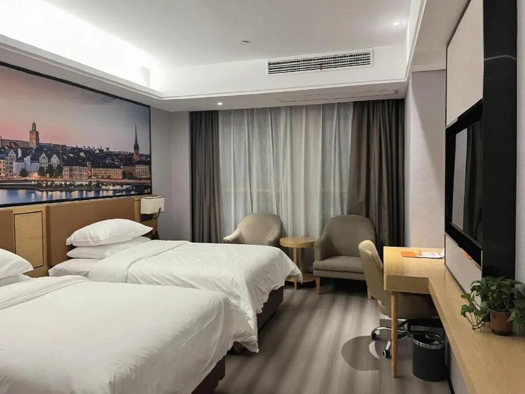 Bed in Vienna Hotel Jiangxi Shangrao High-Speed Railway Station