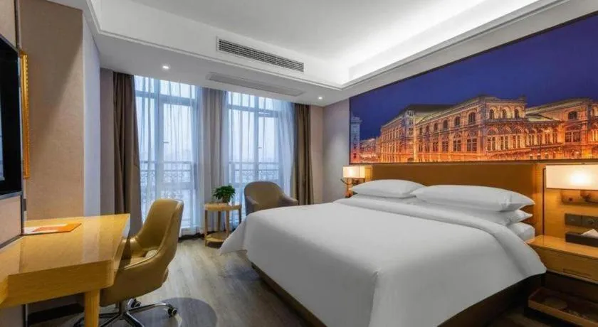 Bed in Vienna Hotel Jiangxi Shangrao High-Speed Railway Station