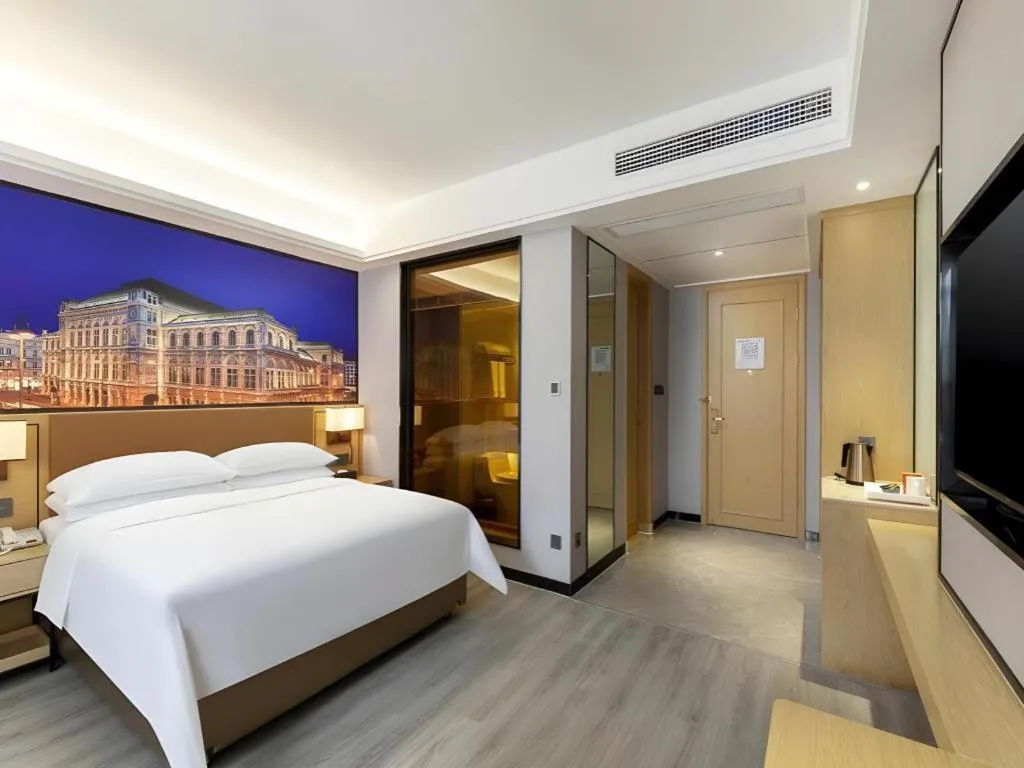 Bed in Vienna Hotel Jiangxi Shangrao High-Speed Railway Station