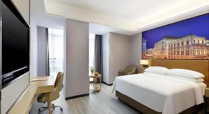 Bed in Vienna Hotel Jiangxi Shangrao High-Speed Railway Station