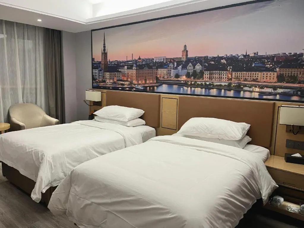 Bed in Vienna Hotel Jiangxi Shangrao High-Speed Railway Station