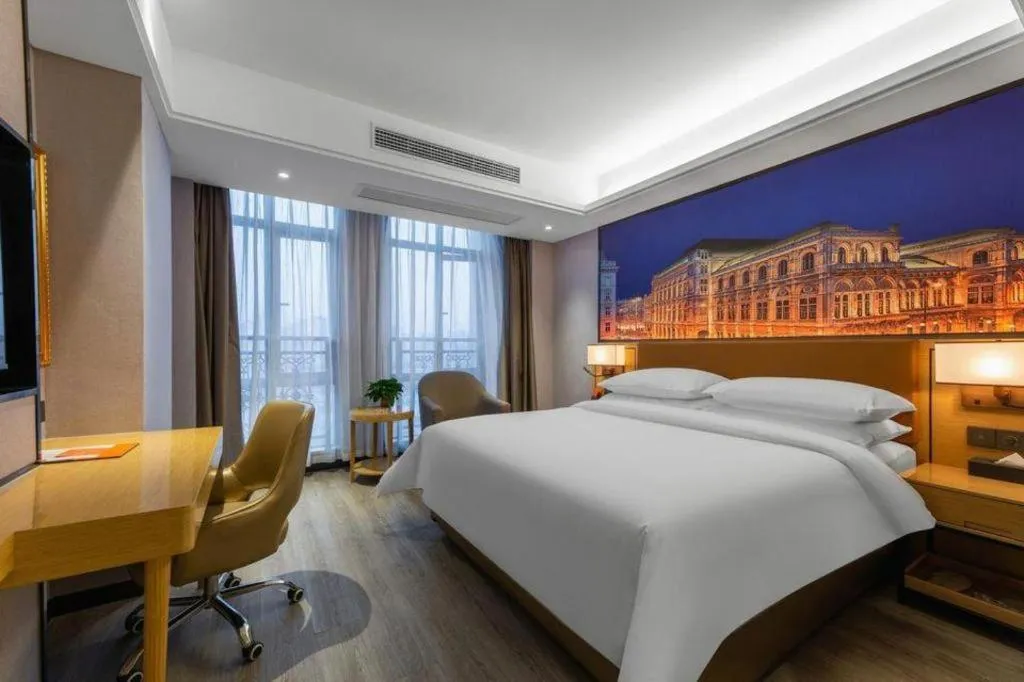 Bed in Vienna Hotel Jiangxi Shangrao High-Speed Railway Station