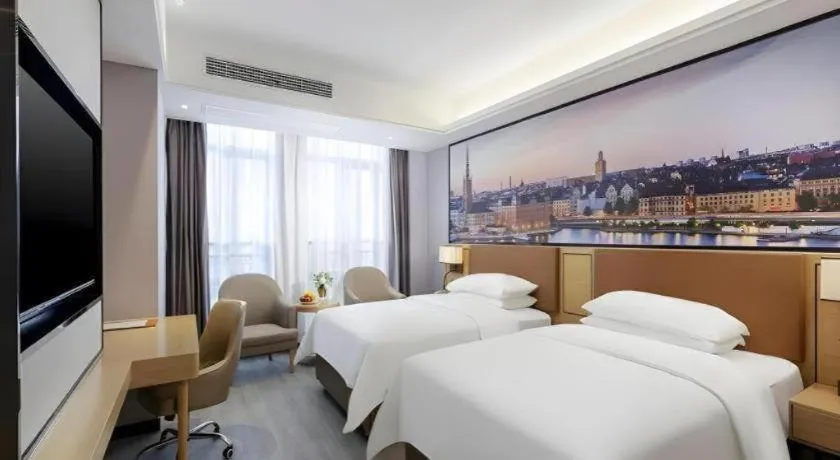 Bed in Vienna Hotel Jiangxi Shangrao High-Speed Railway Station