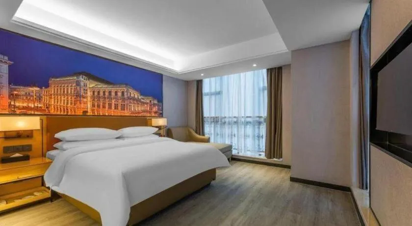 Bed in Vienna Hotel Jiangxi Shangrao High-Speed Railway Station