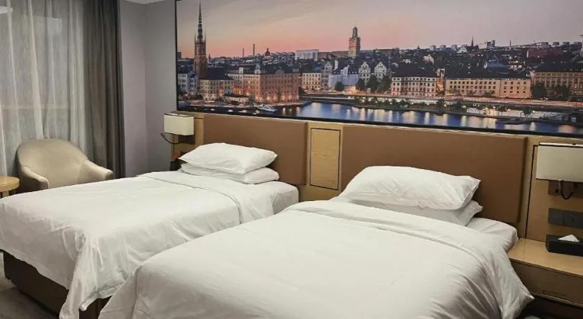 Bed in Vienna Hotel Jiangxi Shangrao High-Speed Railway Station