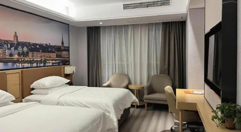 Bed in Vienna Hotel Jiangxi Shangrao High-Speed Railway Station