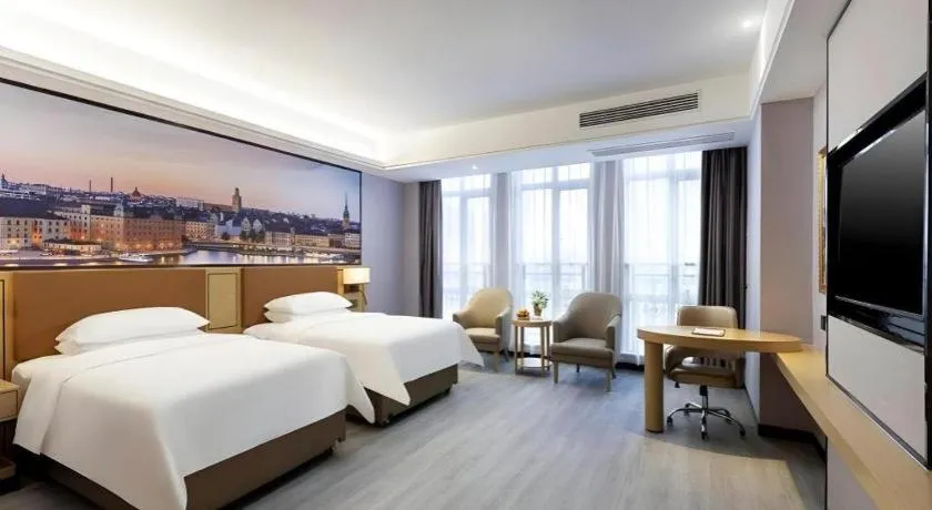 Bed in Vienna Hotel Jiangxi Shangrao High-Speed Railway Station
