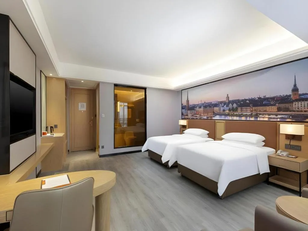 Bed in Vienna Hotel Jiangxi Shangrao High-Speed Railway Station