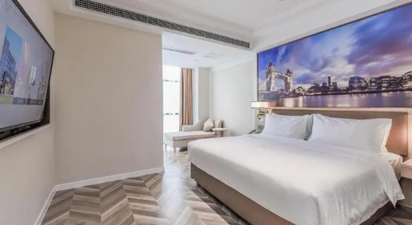 Bed in Vienna Hotel Sichuan Hejiang Yangtze River Bridge