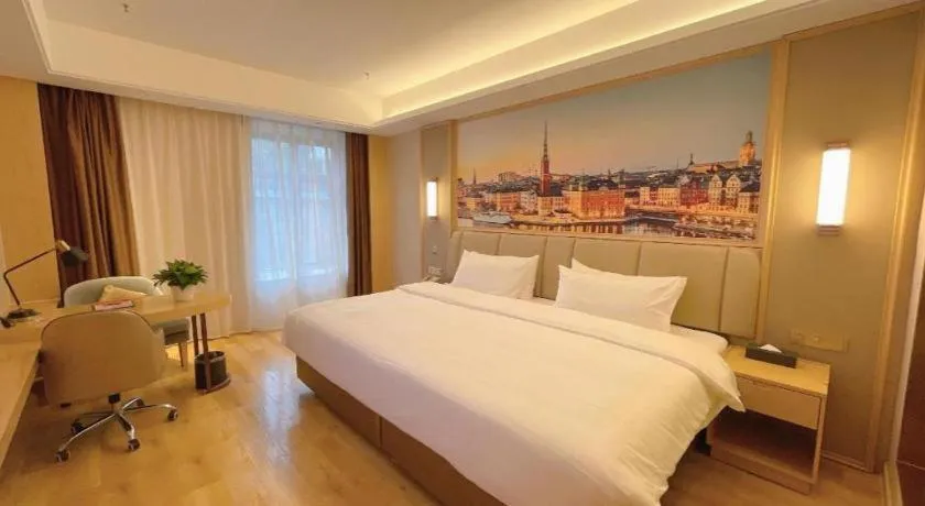 Bed in Vienna Hotel Sichuan Hejiang Yangtze River Bridge