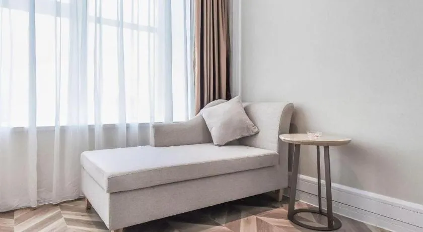 Bed in Vienna Hotel Sichuan Hejiang Yangtze River Bridge