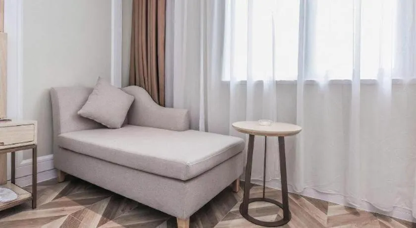 Bed in Vienna Hotel Sichuan Hejiang Yangtze River Bridge