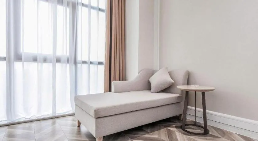 Bed in Vienna Hotel Sichuan Hejiang Yangtze River Bridge