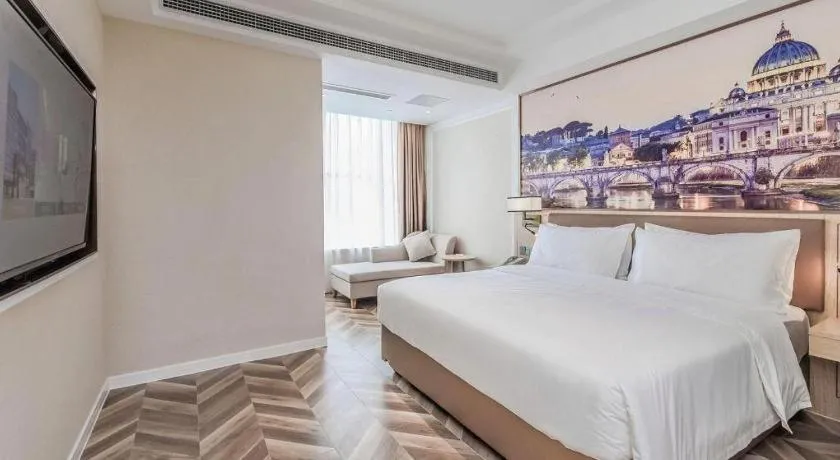 Bed in Vienna Hotel Sichuan Hejiang Yangtze River Bridge