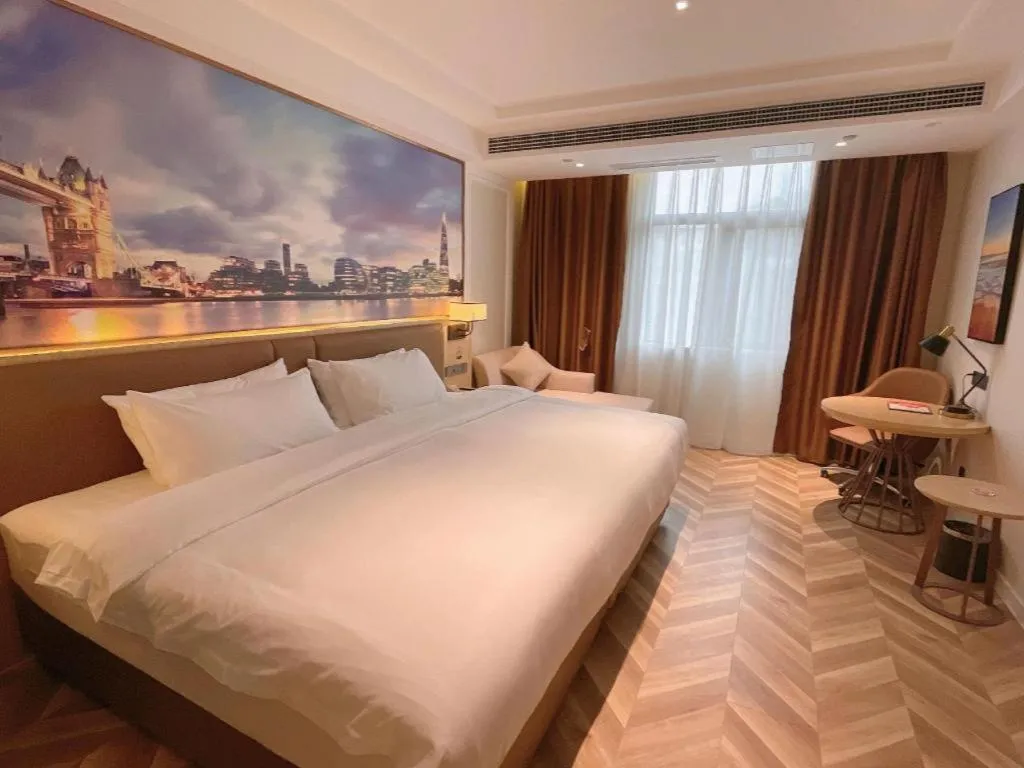 Bed in Vienna Hotel Sichuan Hejiang Yangtze River Bridge