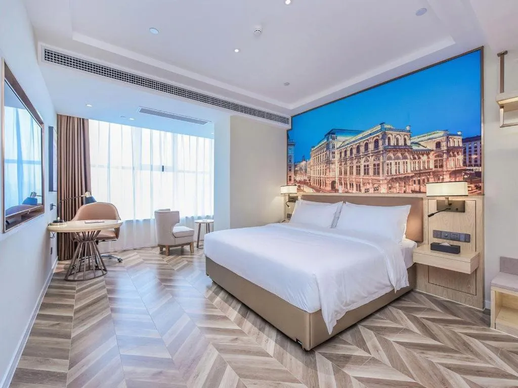 Bed in Vienna Hotel Sichuan Hejiang Yangtze River Bridge