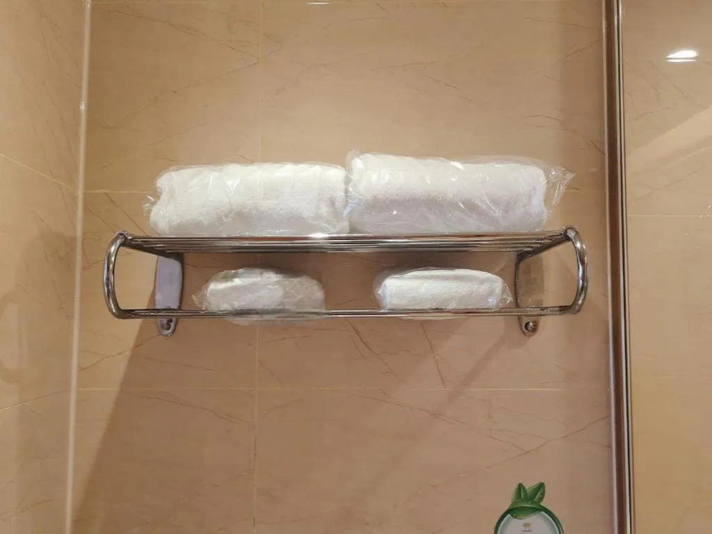 Bed in Vienna Hotel Guangxi Beiliu Passenger Station