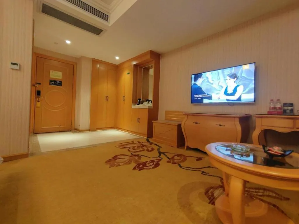 Bed in Vienna Hotel Guangxi Beiliu Passenger Station