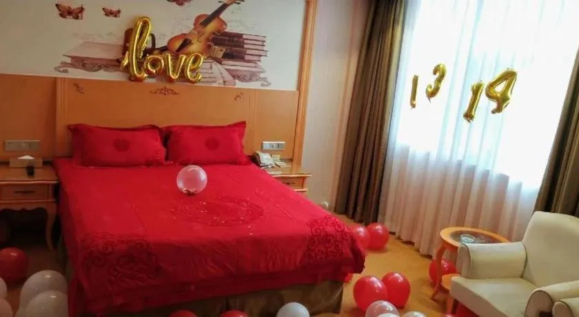 Bed in Vienna Hotel Guangxi Beiliu Passenger Station