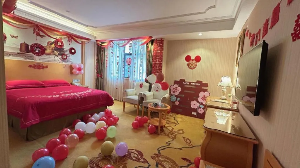 Bed in Vienna Hotel Guangxi Beiliu Passenger Station