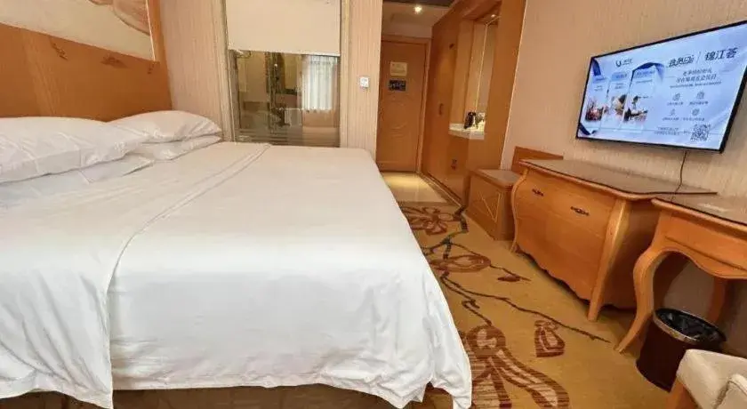 Bed in Vienna Hotel Guangxi Beiliu Passenger Station Bed in Vienna Hotel Guangxi Beiliu Passenger Station