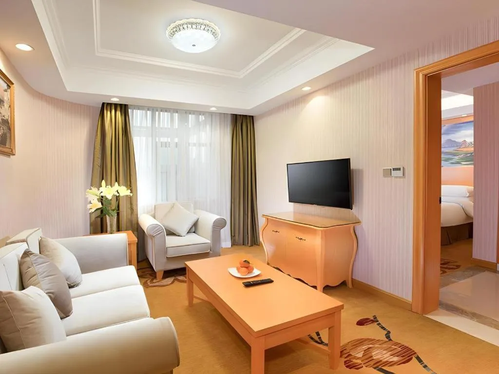 Bed in Vienna Hotel Guangxi Beiliu Passenger Station