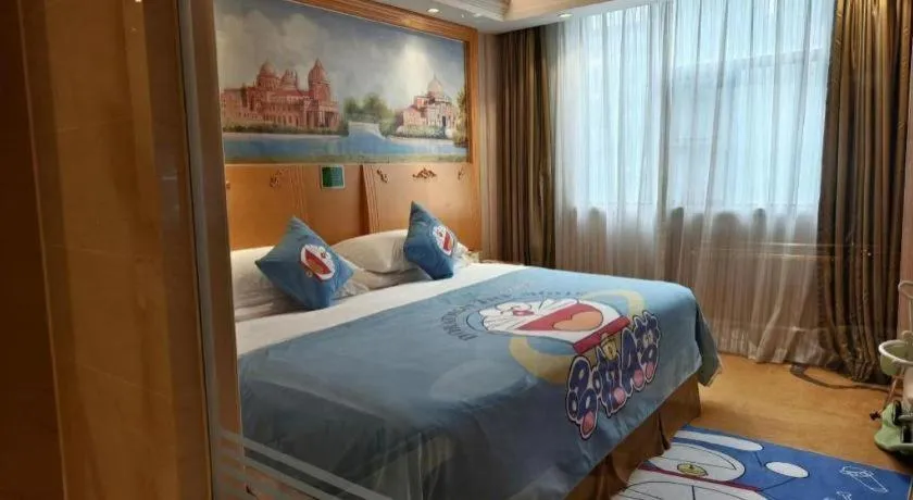 Bed in Vienna Hotel Guangxi Beiliu Passenger Station