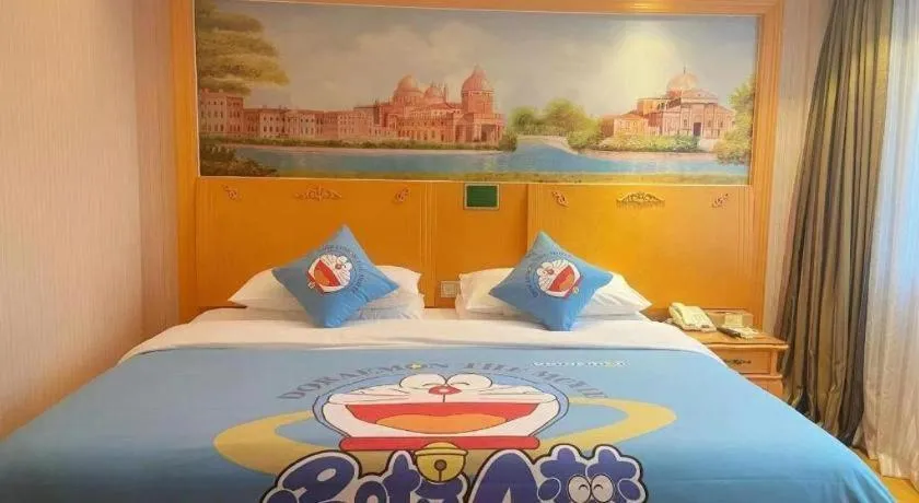Bed in Vienna Hotel Guangxi Beiliu Passenger Station