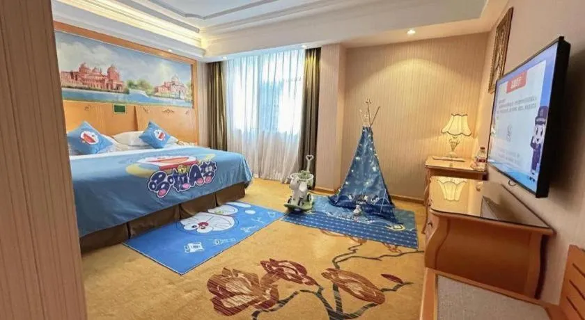 Bed in Vienna Hotel Guangxi Beiliu Passenger Station