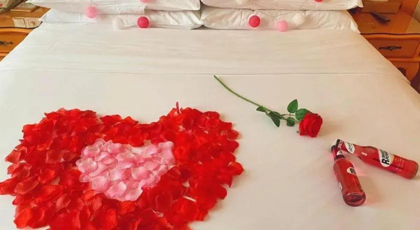 Bed in Vienna Hotel Guangxi Beiliu Passenger Station