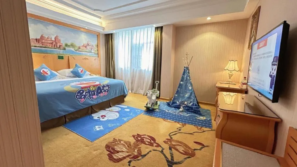 Bed in Vienna Hotel Guangxi Beiliu Passenger Station