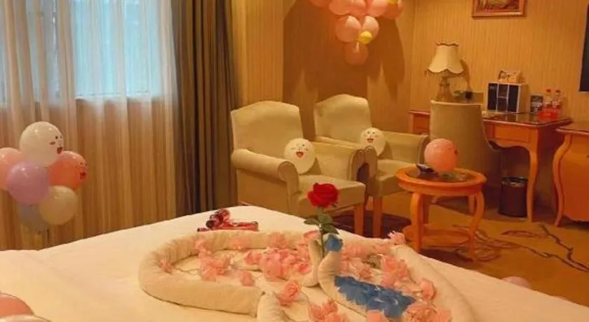 Bed in Vienna Hotel Guangxi Beiliu Passenger Station