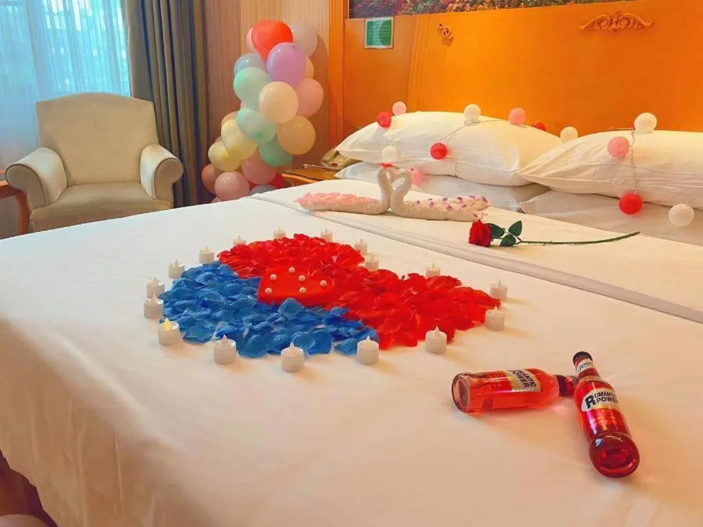 Bed in Vienna Hotel Guangxi Beiliu Passenger Station