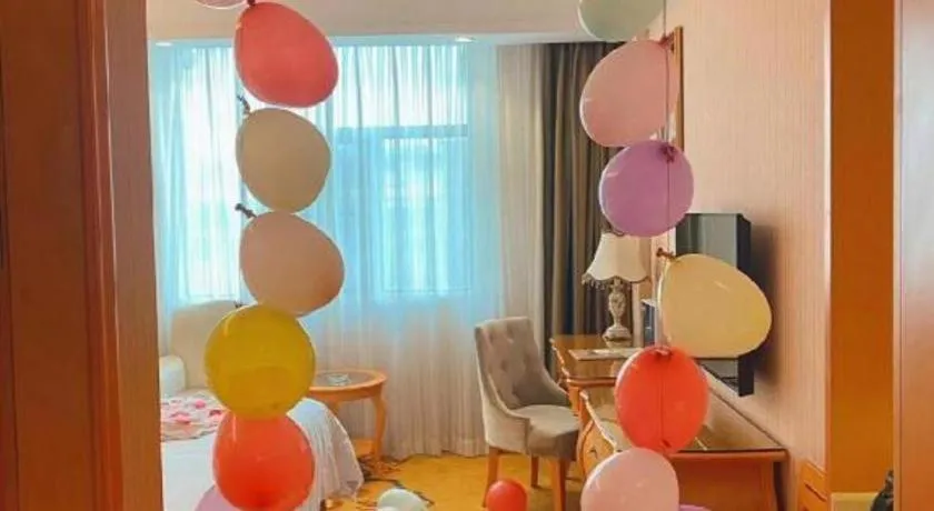 Bed in Vienna Hotel Guangxi Beiliu Passenger Station