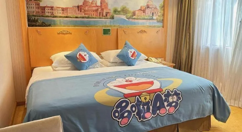 Bed in Vienna Hotel Guangxi Beiliu Passenger Station