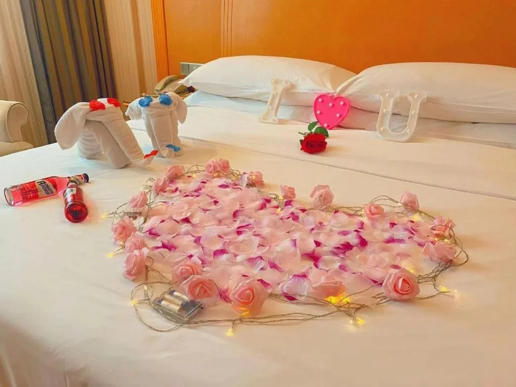 Bed in Vienna Hotel Guangxi Beiliu Passenger Station