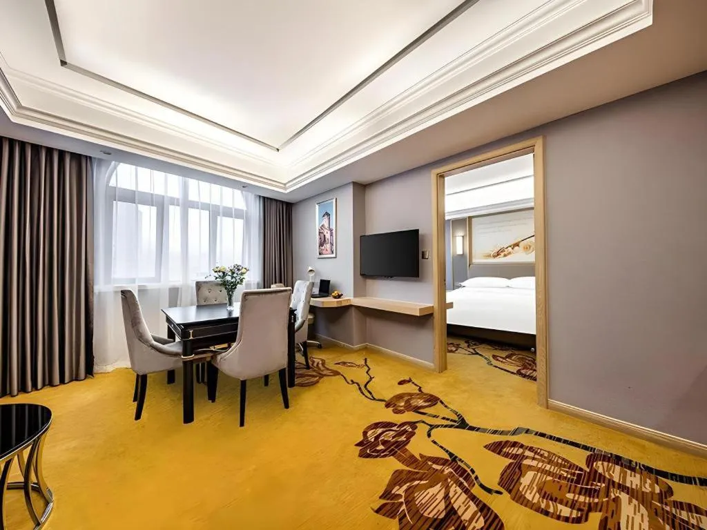 Bed in Vienna Hotel Zhejiang Lishui Qingtian Post Building