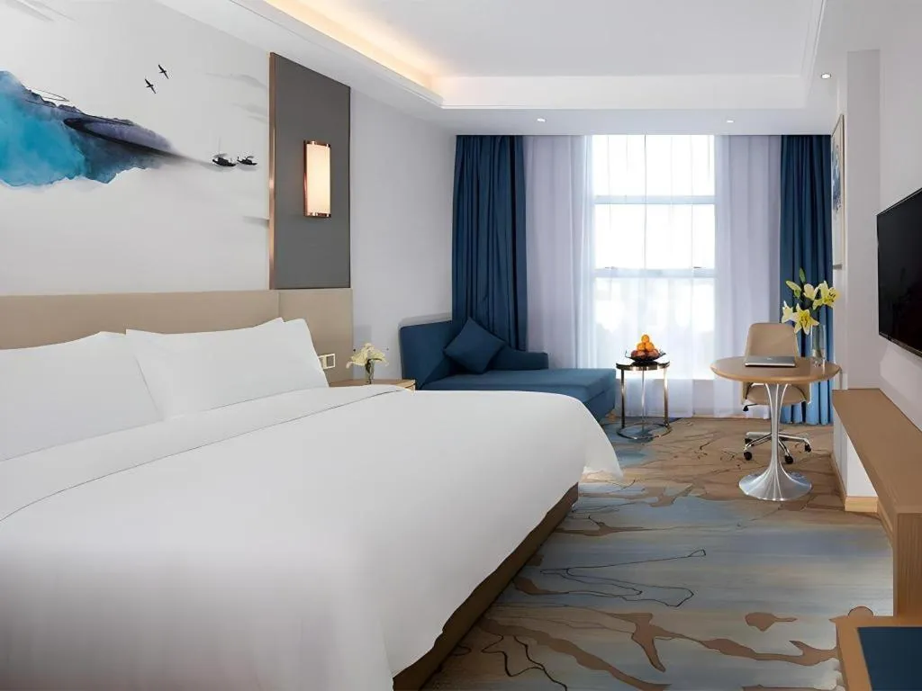 Bed in Vienna Hotel Guangdong Foshan Yihuanlishui