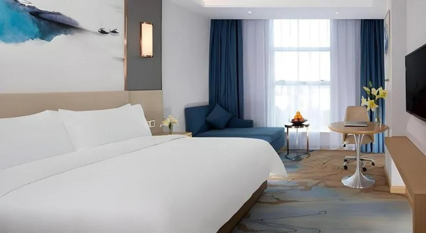 Bed in Vienna Hotel Guangdong Foshan Yihuanlishui
