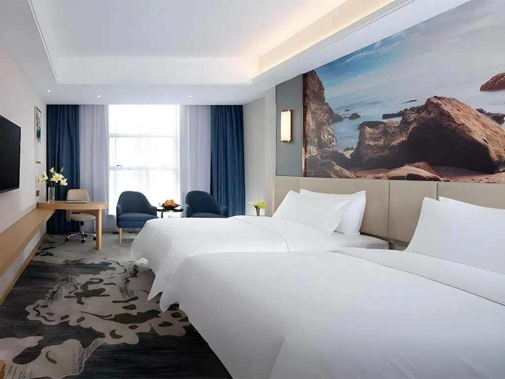 Bed in Vienna Hotel Guangdong Foshan Yihuanlishui