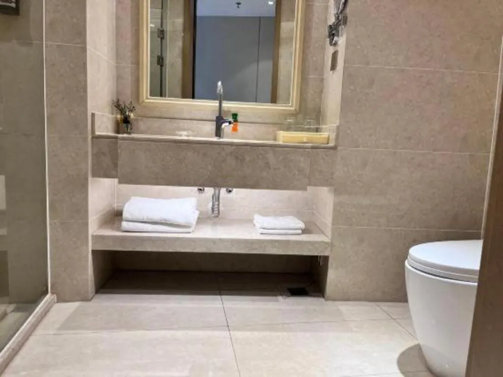 Vienna Hotel Xinfeng West High-Speed Railway Station